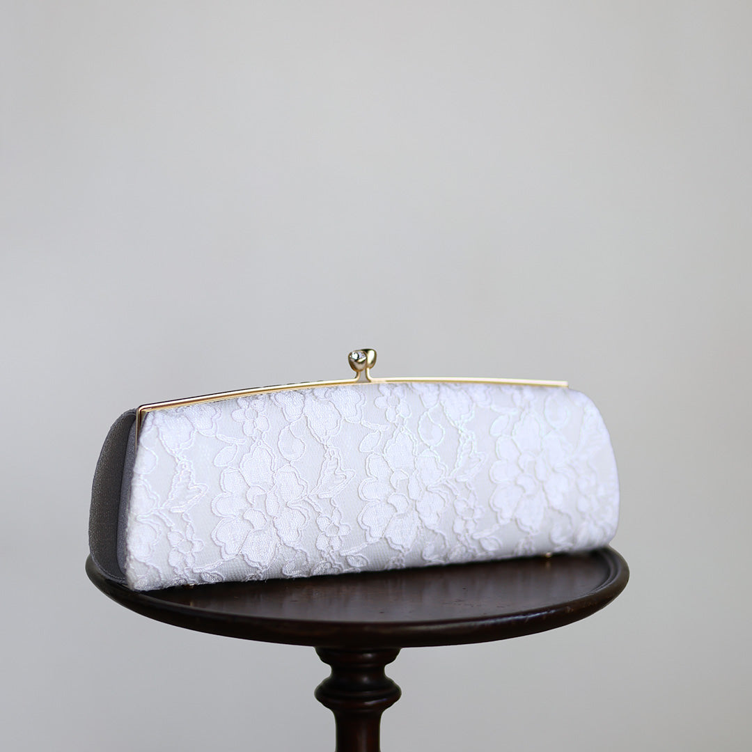 Omi | Pochette faite main avec Nishijin-ori en dentelle blanche