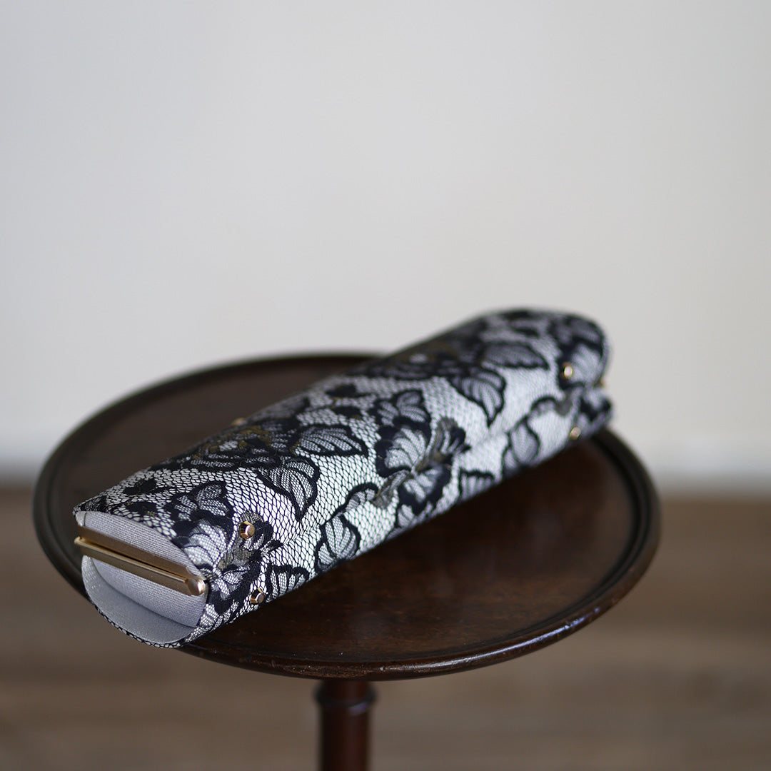Omi | Pochette faite main avec Nishijin-ori en dentelle noire et or